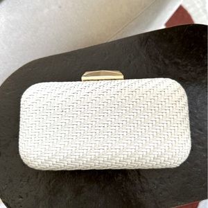Sondra Robert’s clutch leather purse
